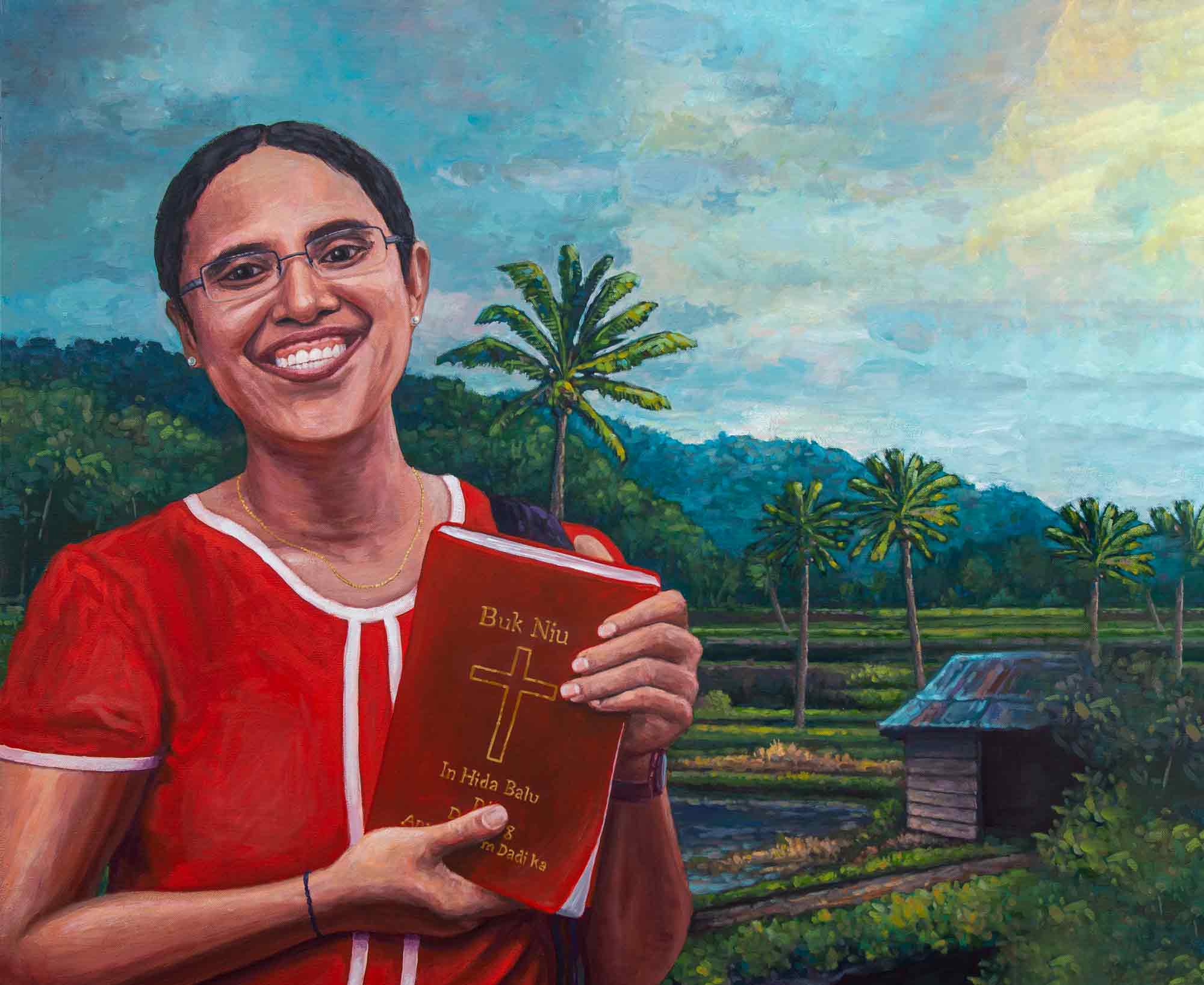 Misriani holds her New Testament